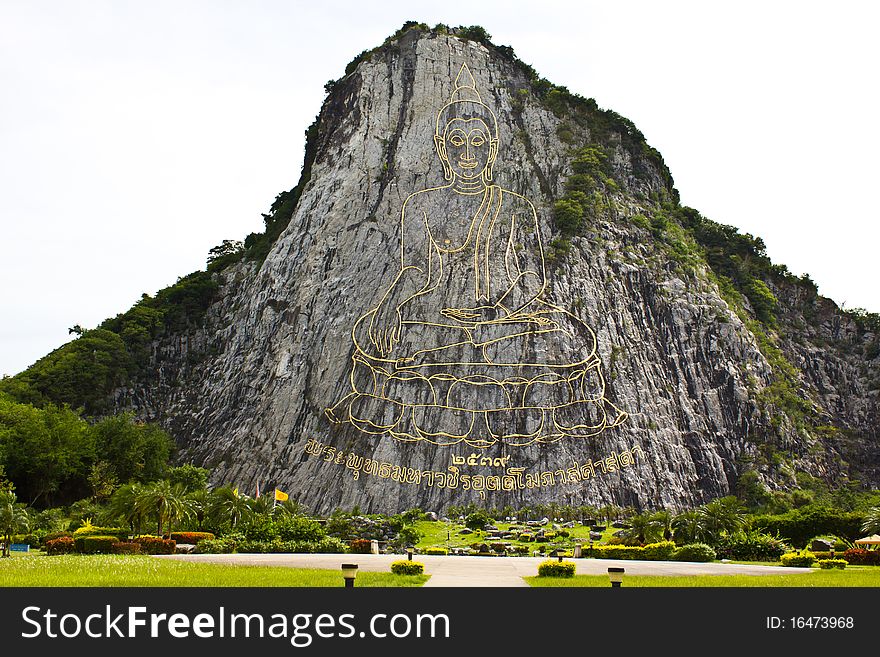 Buddha Sculptural Image On The Rock In Thailand
