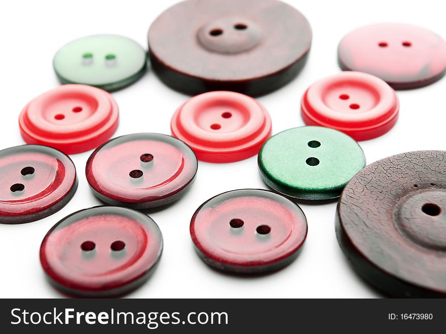 Isolated buttons close-up on a white background