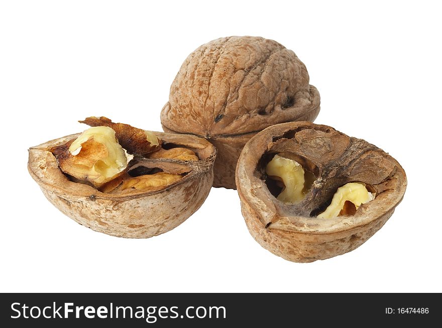 Two walnuts (whole and a cracked one) isolated over white background