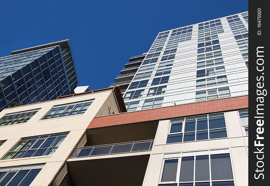 Grouping of office towers against a blue sky