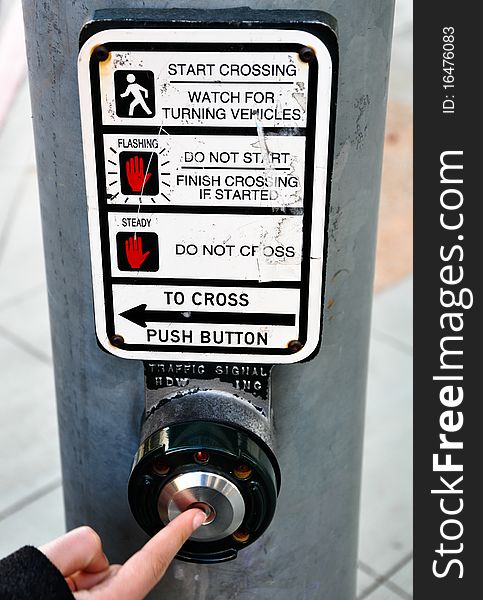 Pressing traffic light button