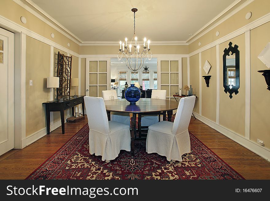 Dining room in luxury home with tan walls. Dining room in luxury home with tan walls