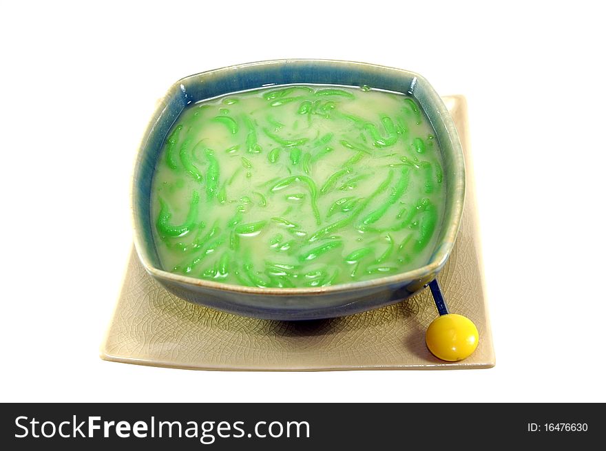 These little green worms are served in a bowl with sweetened coconut milk and plenty of ice. Coconut milk is used to sweeten the dessert with palm sugar and infused with fresh jasmine flowers. These little green worms are served in a bowl with sweetened coconut milk and plenty of ice. Coconut milk is used to sweeten the dessert with palm sugar and infused with fresh jasmine flowers.