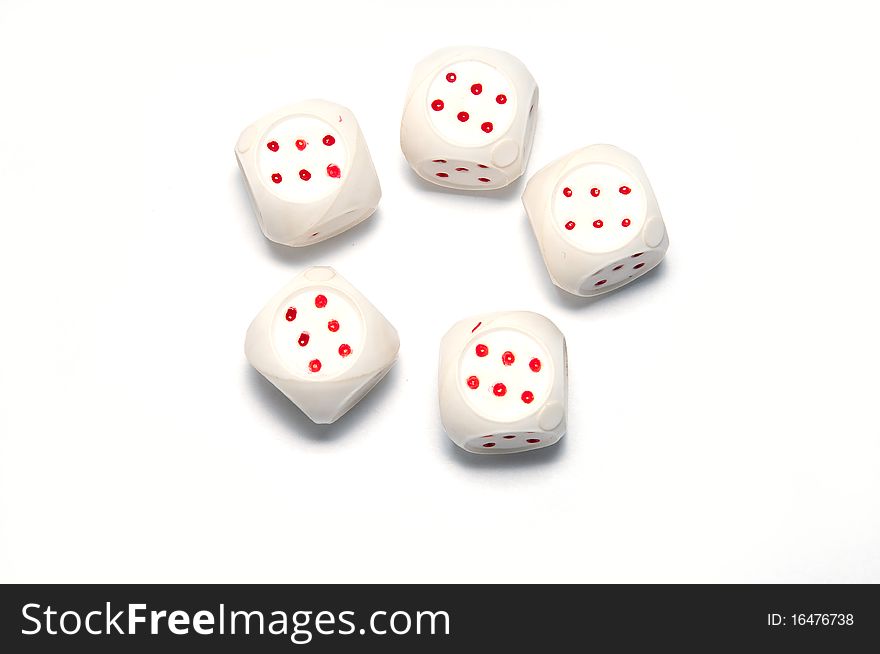 5 white dice with red on white background. 5 white dice with red on white background