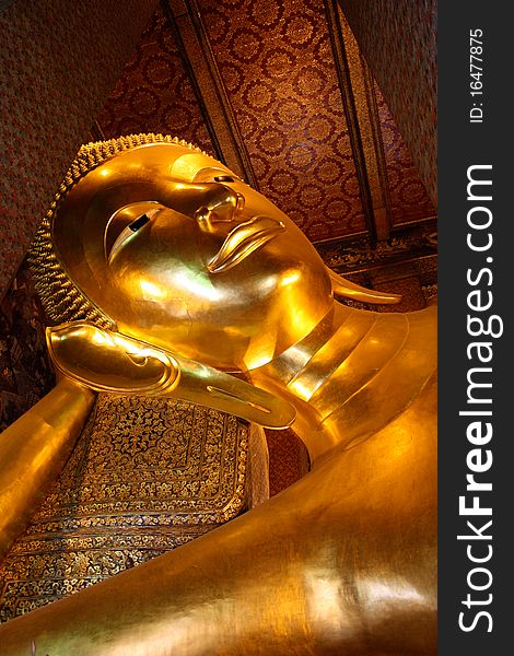 Reclining Buddha image in temple of thailand