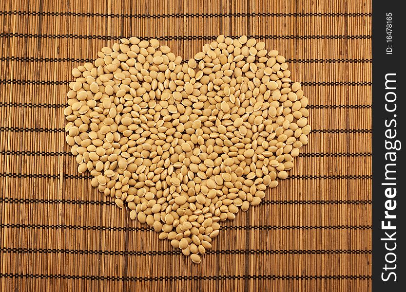 Grain heart on brown background