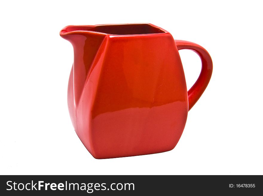 Small red olive oil jug isolated on a white background. Small red olive oil jug isolated on a white background