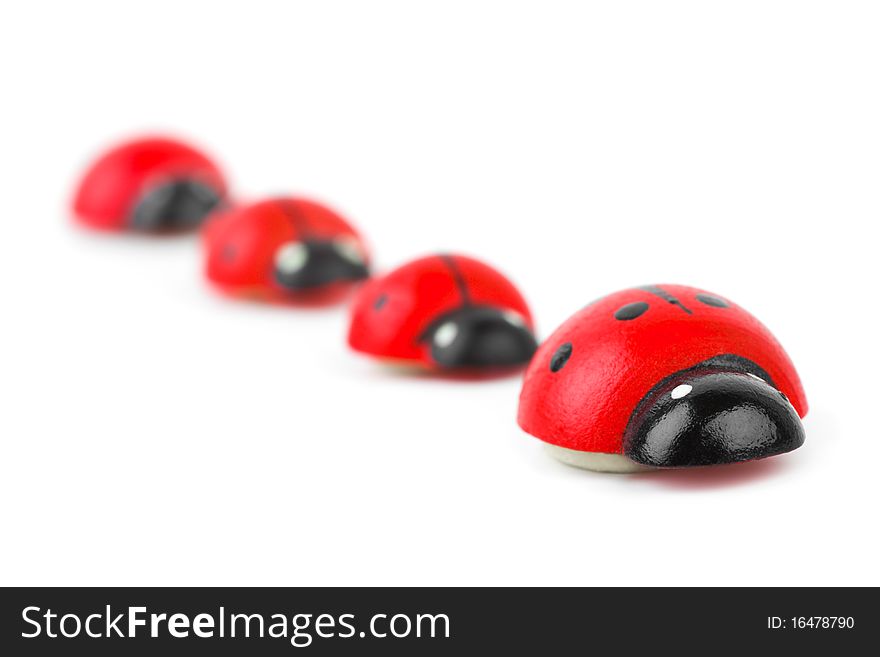 Toy ladybirds isolated on white background