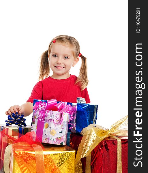 Four years old girl wih the presents. Four years old girl wih the presents