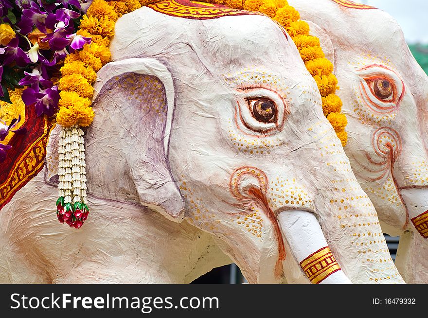 White elephants decorated with Buddha flowers, very oriental style picture can make a very nice background.