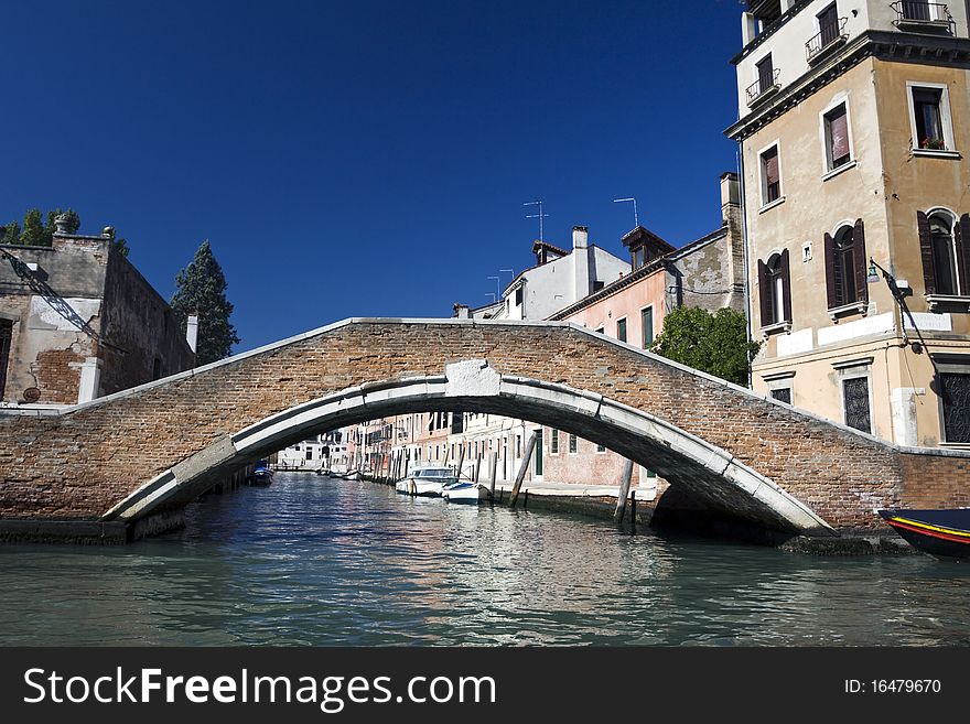 Canal And Bridge In Venice
