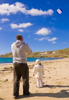 A Little Girl And Dad Run Kite In Sky With Clouds Royalty Free Stock Images