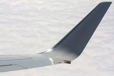 Plane Wing Over Clouds Stock Images