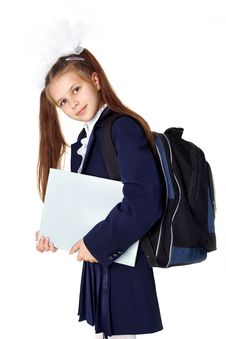 Little Girl With Backpack And Book Stock Photography
