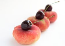 Peaches And Cherries On White Background Stock Photography Peaches And Cherries On White Background Stock Photography