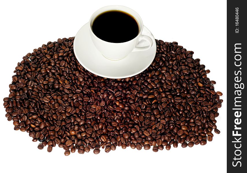 Cup Of Coffee On Coffee Beans