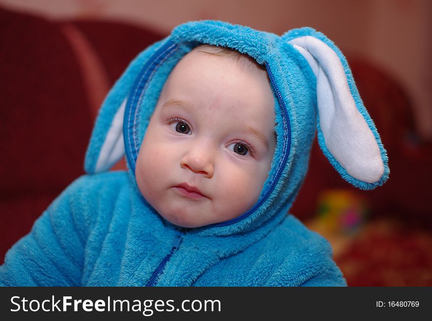 Photo of baby boy in suit of the rabbit