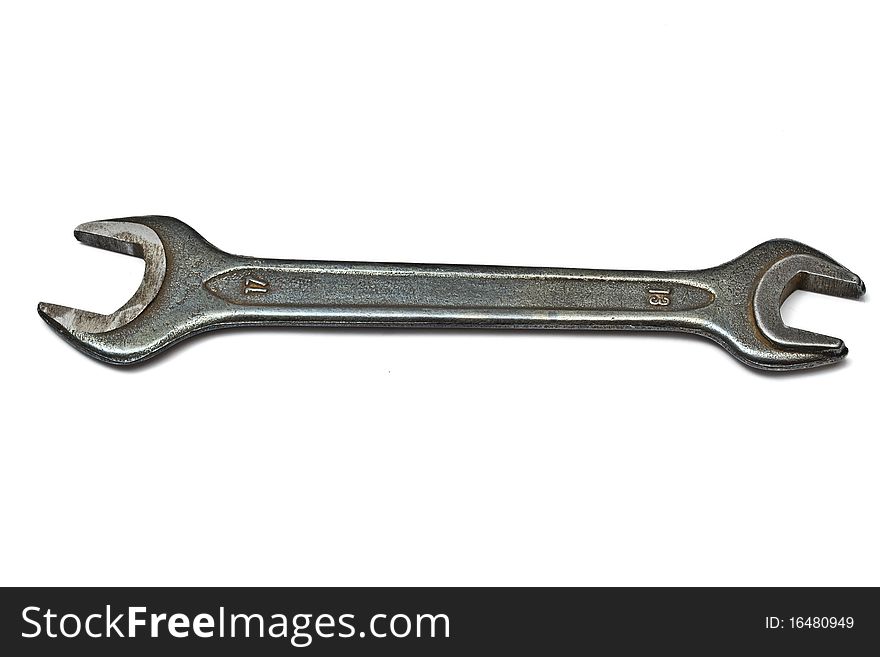 An old wrench isolated on white background