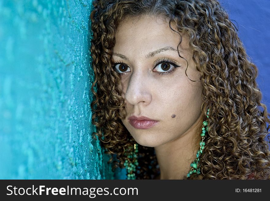 Attractive Arabic young woman with curly hair. Attractive Arabic young woman with curly hair