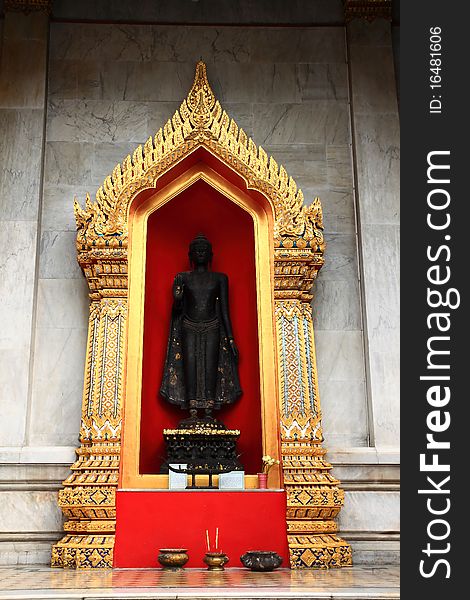 Statue of Buddha in temple of Bangkok Thailand.