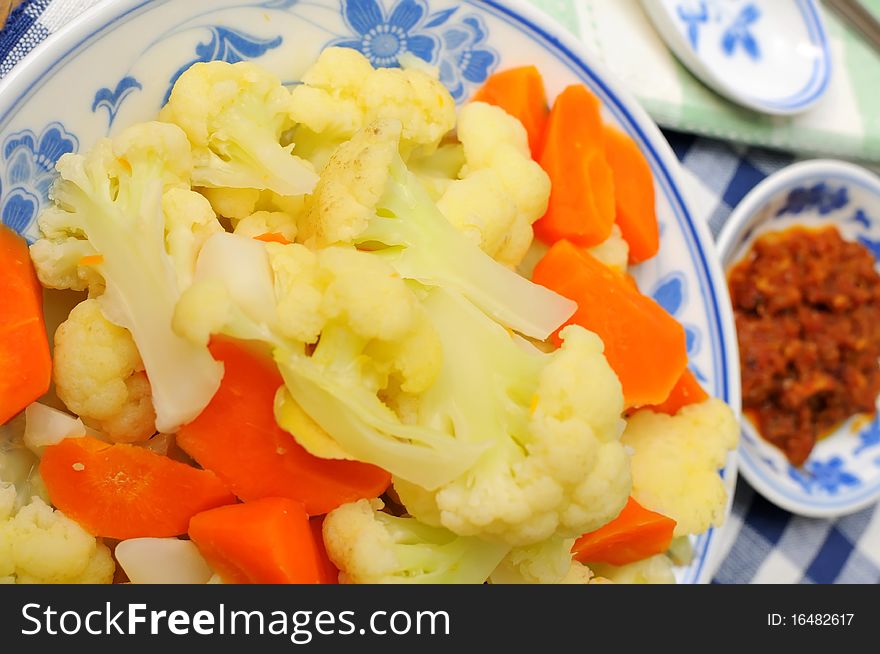 Traditional Oriental delicacy served on China kitchenware.