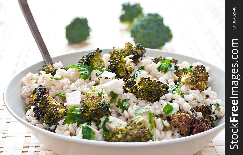 Broccoli salad with parsley, farro and cheese. Broccoli salad with parsley, farro and cheese