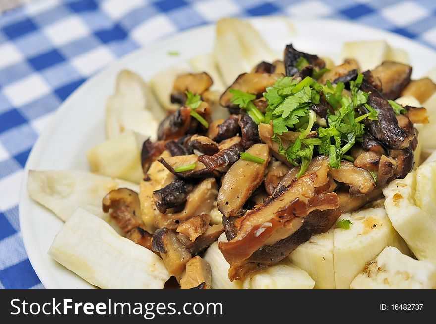 Unique Chinese style brinjal dish with generous mushroom topping.