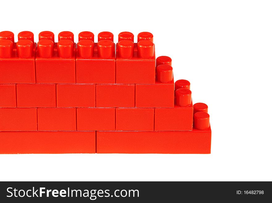 Fragment of a toy, brick wall, built out of plastic bricks