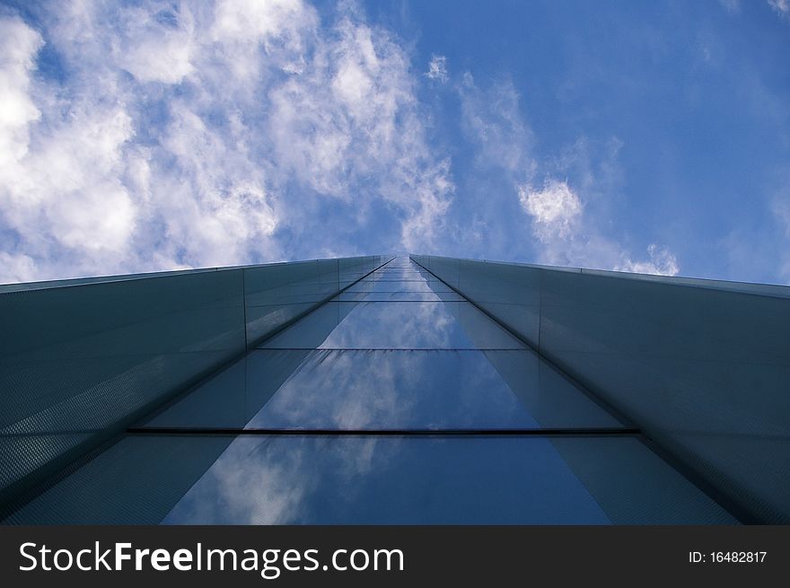 Modern Building Reflecting Clouds