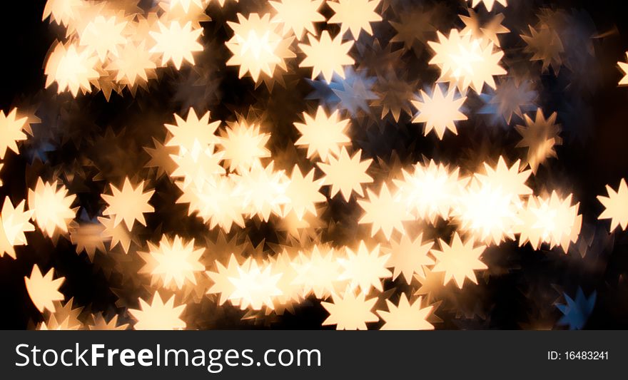 Colorful defocused star lights background. Colorful defocused star lights background