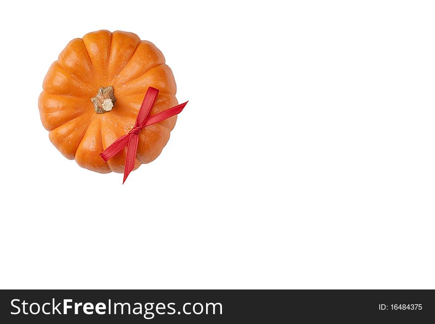 Small orange pumpkins symbolising autumn holidays and used in decorative works.