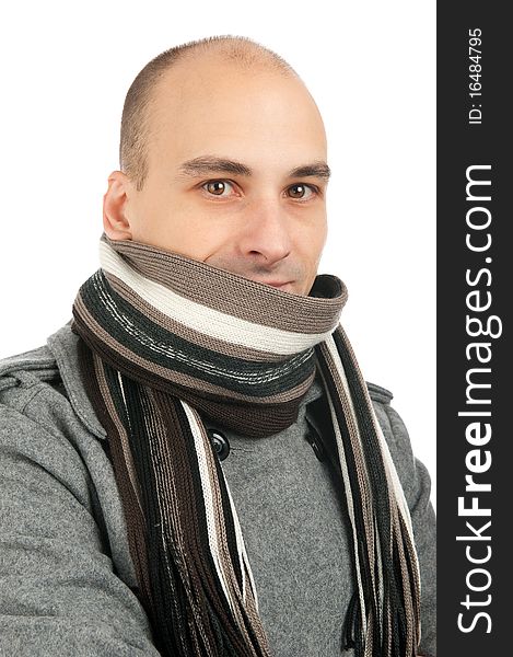 Attractive male wearing a coat and scarf. Attractive male wearing a coat and scarf