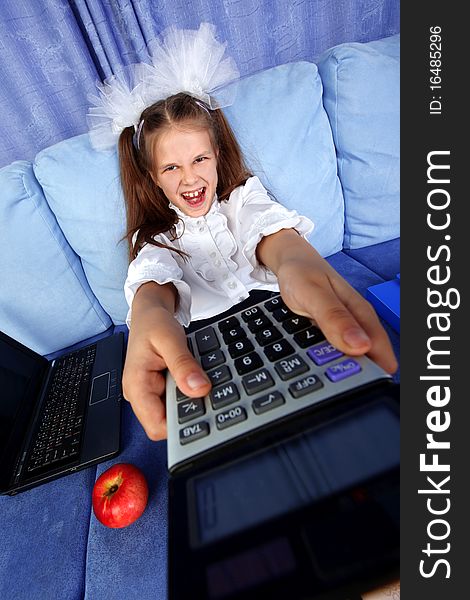 Girl with calculator, laptop