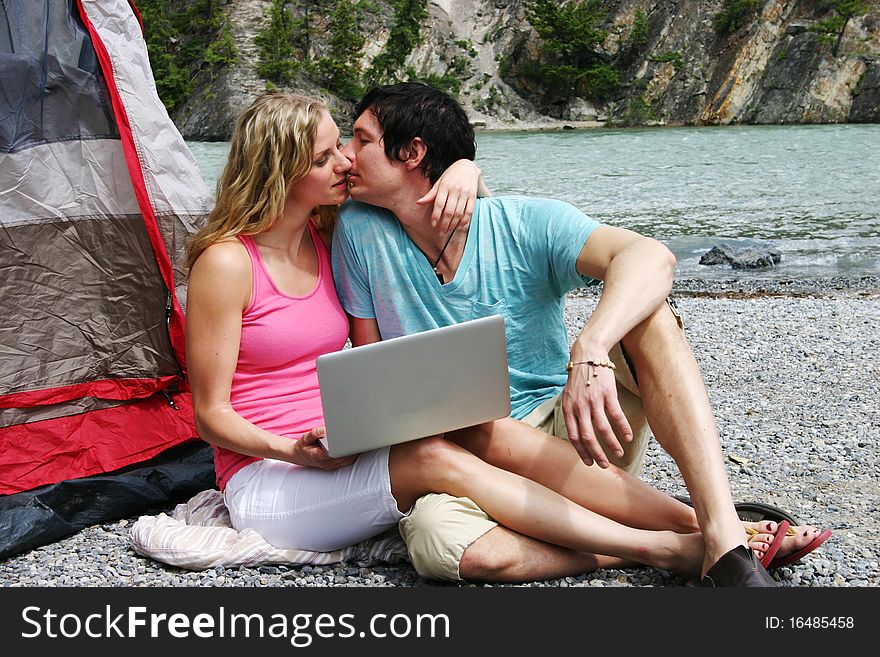 Couple ready for kiss while camping. Couple ready for kiss while camping