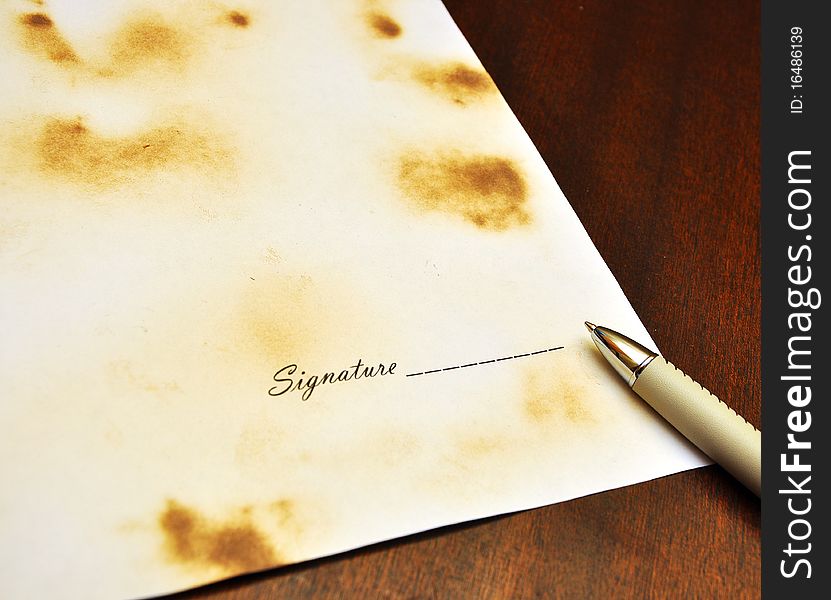 Pen with a sheet of paper for signature. Pen with a sheet of paper for signature