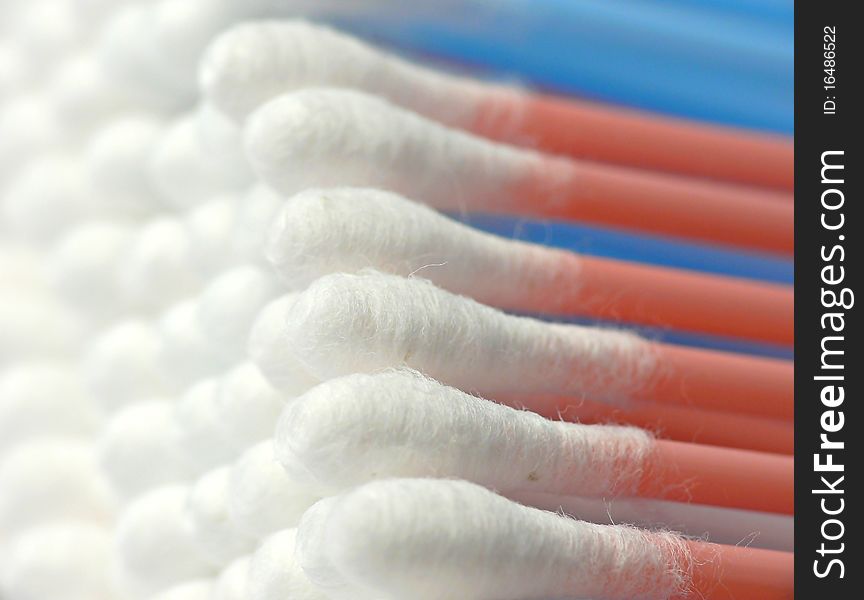 Colorful cosmetic cotton sticks close-up. Colorful cosmetic cotton sticks close-up