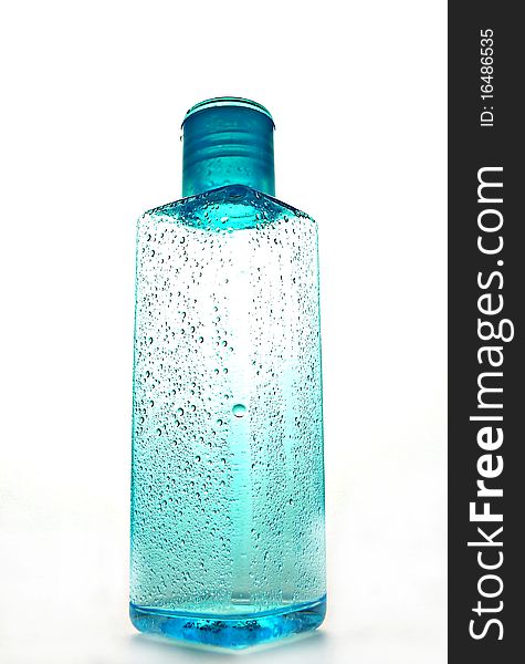 Blue misty bottle on white