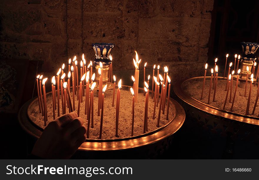 Burning candles in ortodox church. Burning candles in ortodox church.
