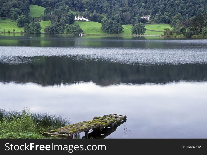 Rustic pier on the shores of a calm lake