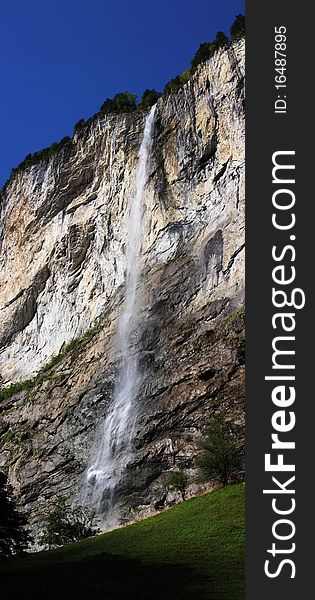 Small waterfall with white waves. Small waterfall with white waves