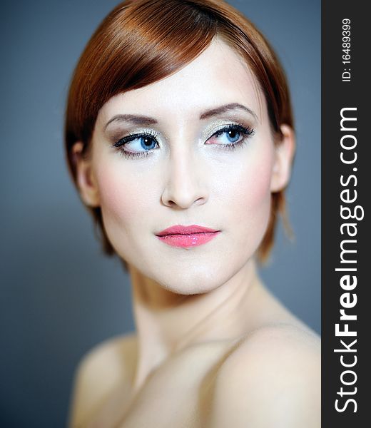 Portrait of pretty woman with pure healthy skin and natural make-up in brown tones. Portrait of pretty woman with pure healthy skin and natural make-up in brown tones