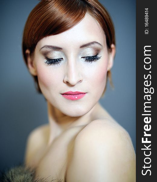 Portrait of pretty woman with pure healthy skin and natural make-up in brown tones. Portrait of pretty woman with pure healthy skin and natural make-up in brown tones