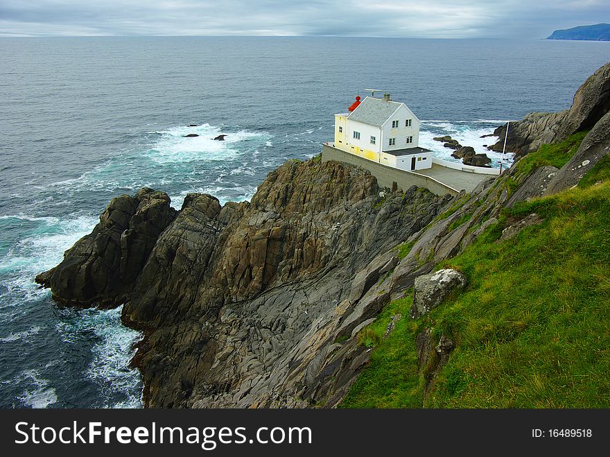 On the photo:Picturesque Norway landscape with lighthouse.