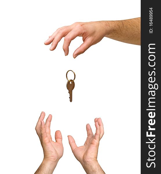 Close up of hands  and golden key isolated on white background