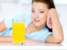 Girl With A Glass Of Fresh Orange Juice Royalty Free Stock Image Girl With A Glass Of Fresh Orange Juice Royalty Free Stock Image