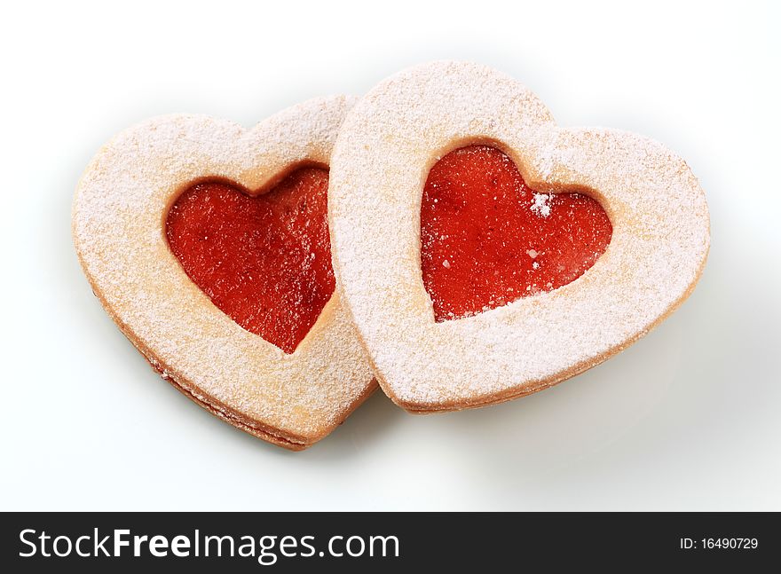 Heart shaped shortbread cookies with jam filling