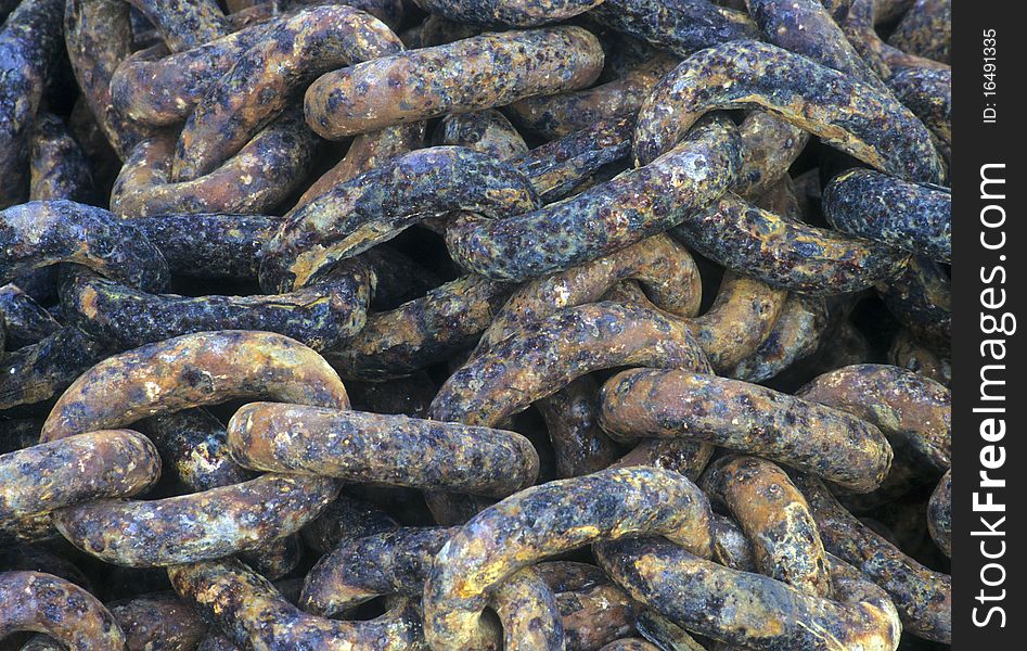 Old rusty links of a chain. Old rusty links of a chain