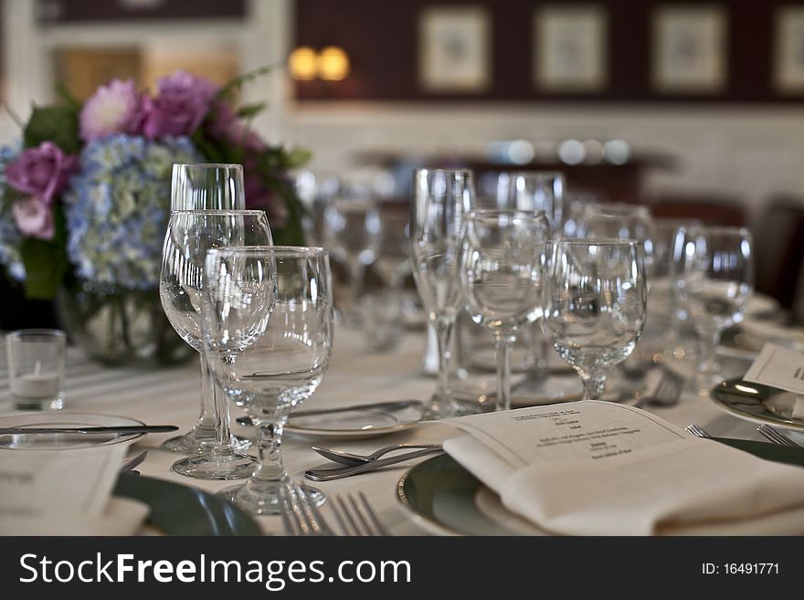 Untouched table setting prior to a wedding. Untouched table setting prior to a wedding