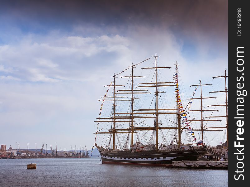 Masts of sailing ships lying at the wharf skyline. Masts of sailing ships lying at the wharf skyline