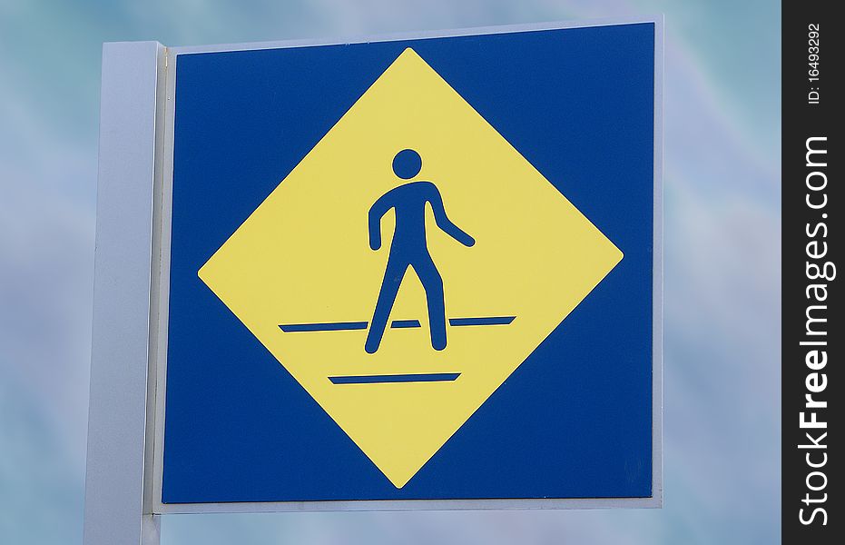 Pedestrian Walking Sign to alert drivers to show down for walking traffic. Pedestrian Walking Sign to alert drivers to show down for walking traffic